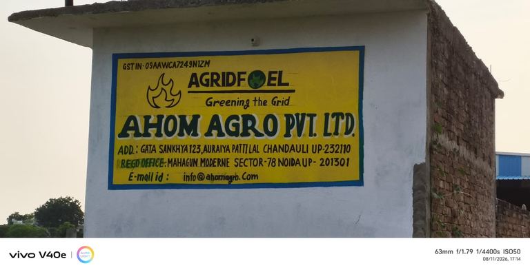 Painted signboard at the Chandauli site reading AGRIDFUEL, Ahom Agro Pvt Ltd.