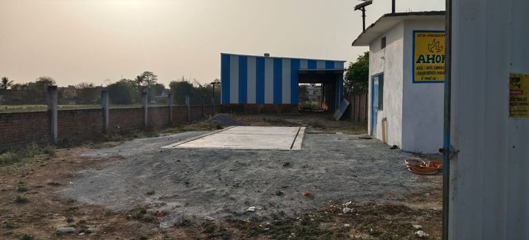 Plant yard at Chandauli with shed structure and concrete pad.